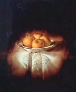 manzanas plato y paño